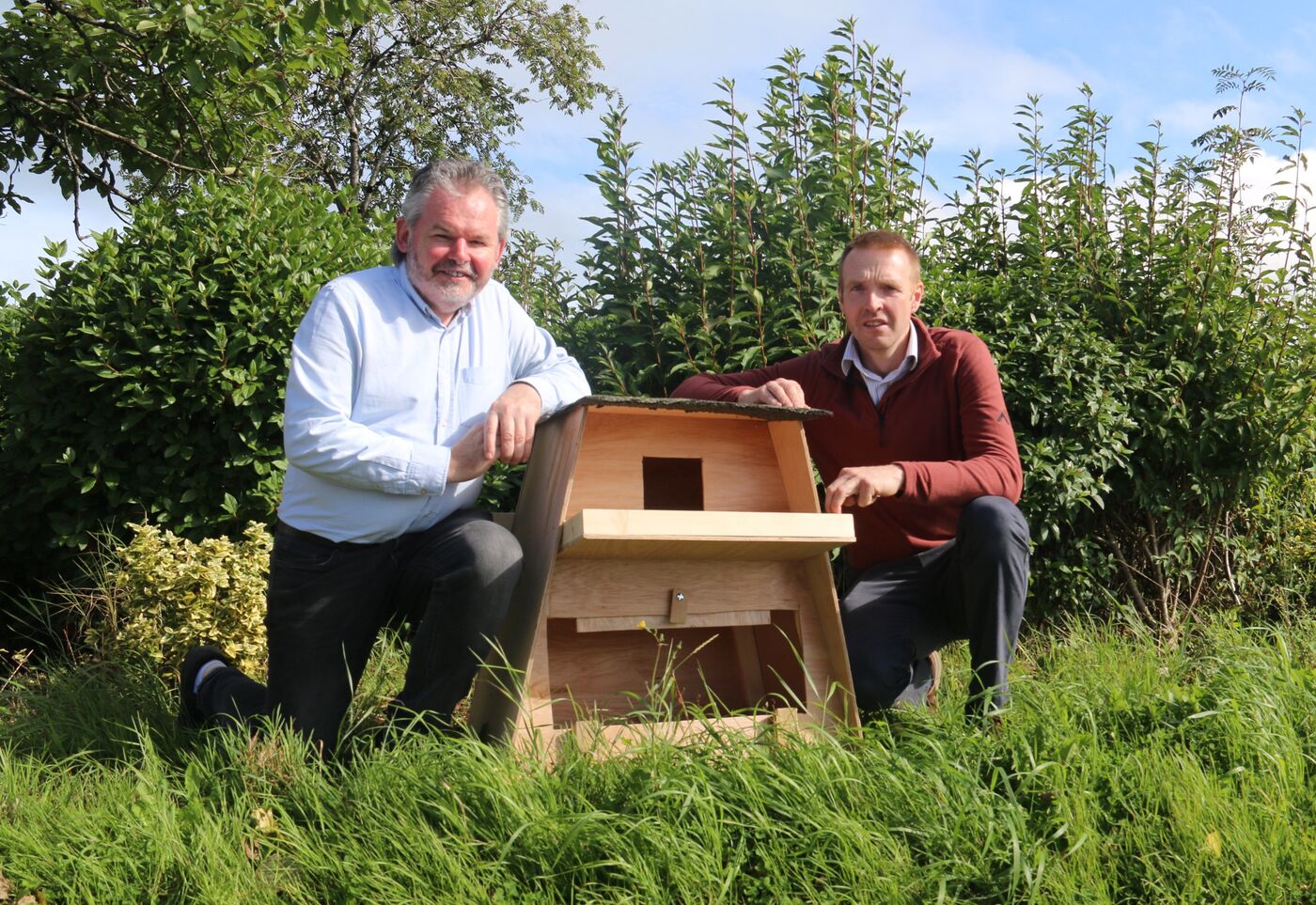 Lauri McCusker and Peter Gallagher with a purpose-designed barn owl nest box